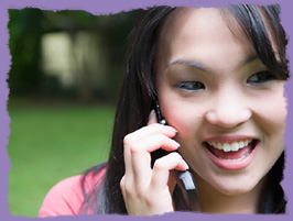 photo: girl using a phone