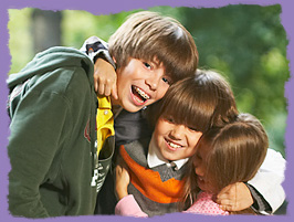 photo: three kids, one with braces