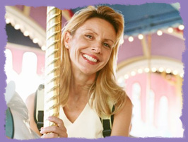 photo: woman on a carousel